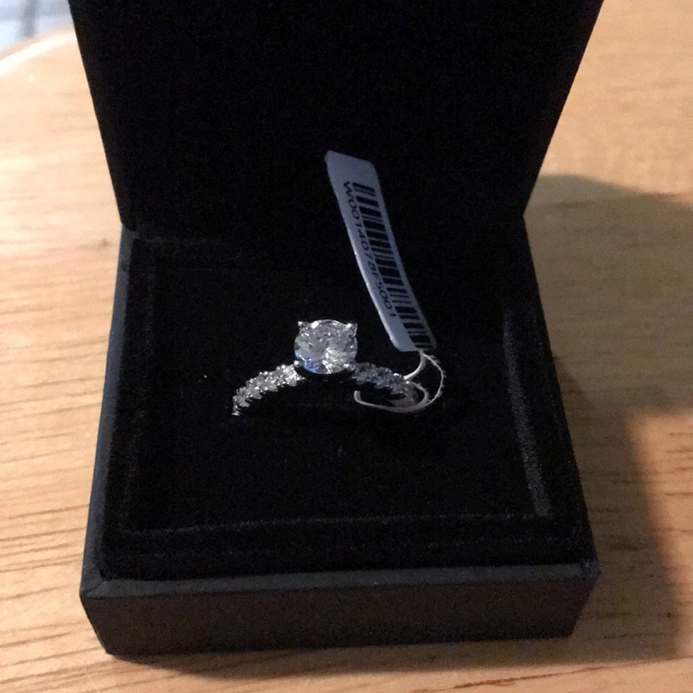 Round cut white sapphire sterling silver ring
